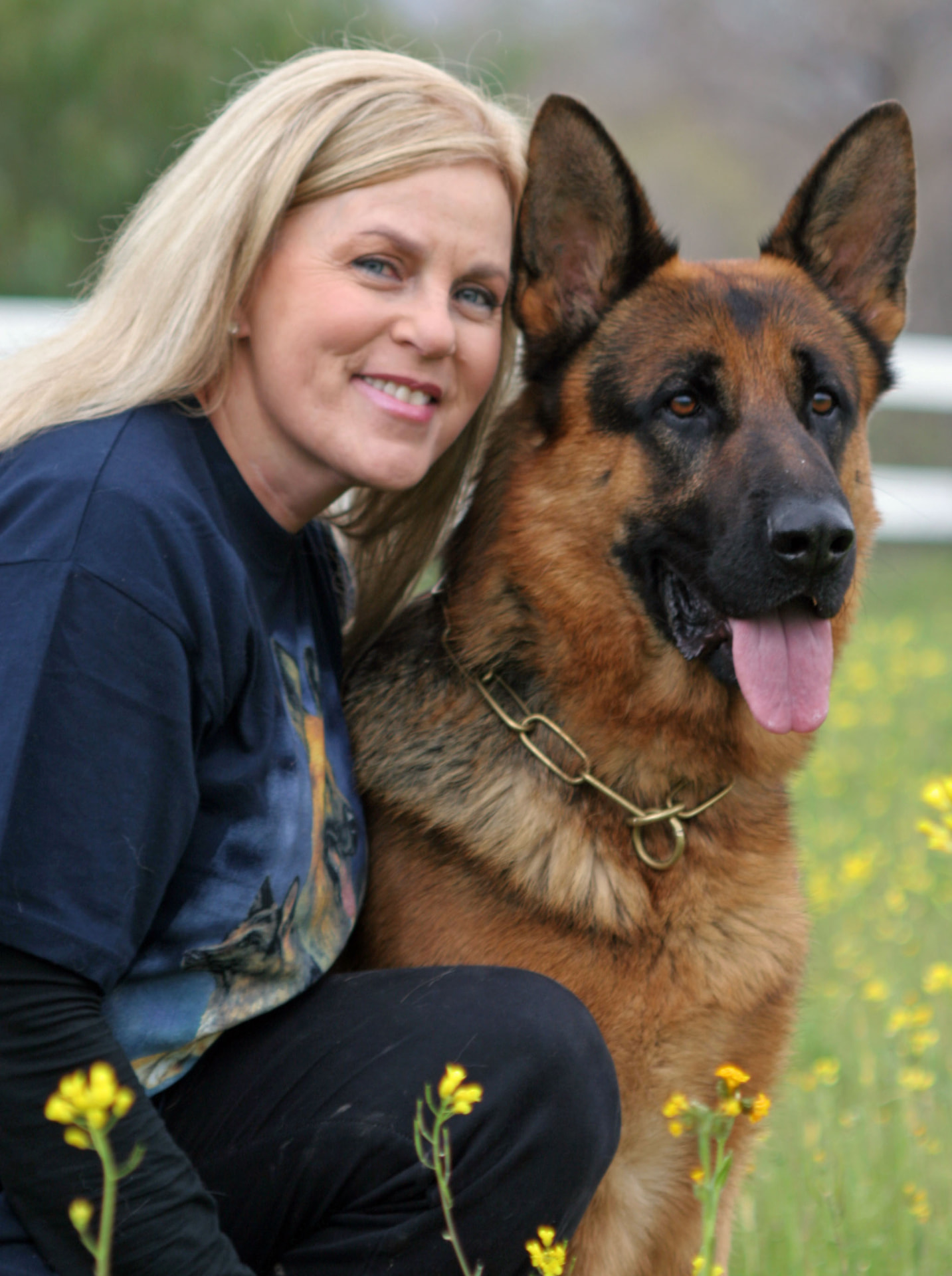 Diana Sparacino, Certified Professional Dog Trainer, with a German Shepherd